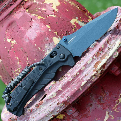 High-performance fishing knife Benchmade Adira with blue PVD hardware